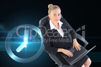 Composite image of businesswoman sitting on swivel chair with la