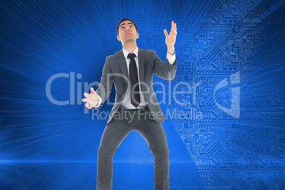 Composite image of unsmiling businessman catching