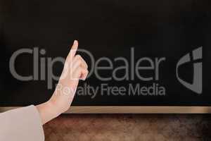 Composite image of businesswoman pointing