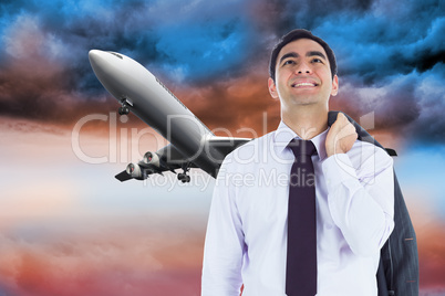 Composite image of smiling businessman standing