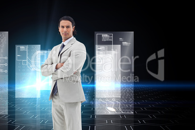 Composite image of serious office worker posing with the arms cr
