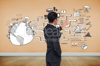 Composite image of asian businessman pointing