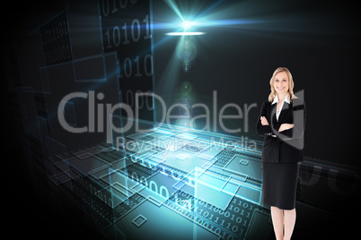 Composite image of a confident businesswoman with folded arms