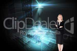 Composite image of a confident businesswoman with folded arms