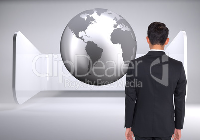 Composite image of businessman turning his back to camera