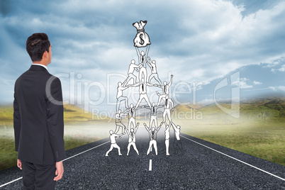 Composite image of businessman turning his back to camera