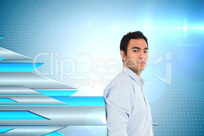 Composite image of unsmiling casual man standing