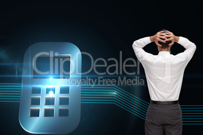 Composite image of businessman standing back to camera hands on