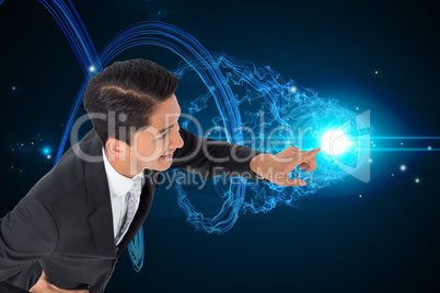 Composite image of smiling asian businessman pointing