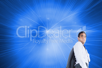 Composite image of unsmiling businessman standing Composite image of unsmiling businessman standing