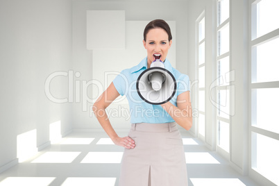 Composite image of furious classy businesswoman talking in megap