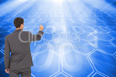 Composite image of businessman standing back to camera writing w