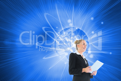 Composite image of businesswoman holding new tablet