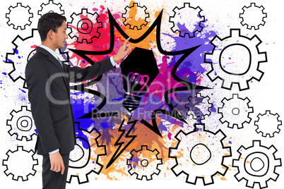 Composite image of serious asian businessman pointing