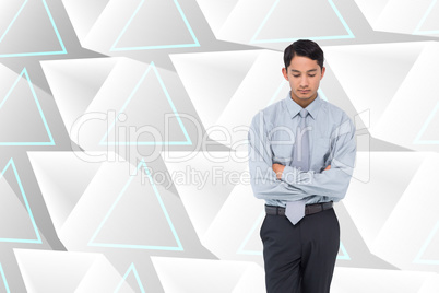 Composite image of serious asian businessman