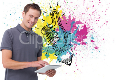 Composite image of smiling young man with tablet computer