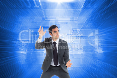 Composite image of unsmiling businessman catching