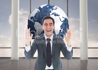 Composite image of excited businessman with arms raised