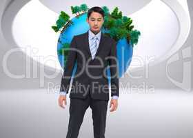 Composite image of serious asian businessman