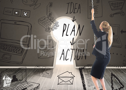 Composite image of businesswoman pulling a chain