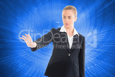 Composite image of businesswoman pointing somewhere