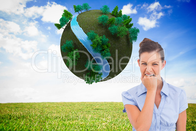 Composite image of furious businesswoman looking at the camera