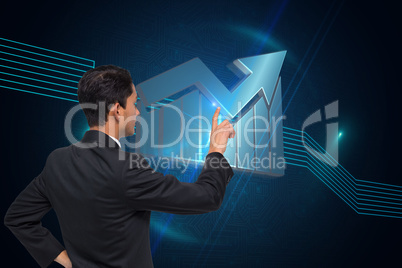 Composite image of unsmiling asian businessman pointing