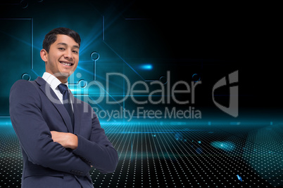 Composite image of smiling asian businessman with arms crossed