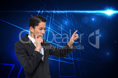 Composite image of thoughtful asian businessman pointing