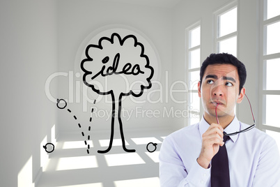 Composite image of thinking businessman holding glasses