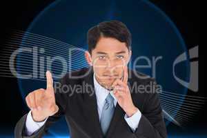 Composite image of thoughtful asian businessman pointing