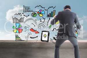 Composite image of businessman catching