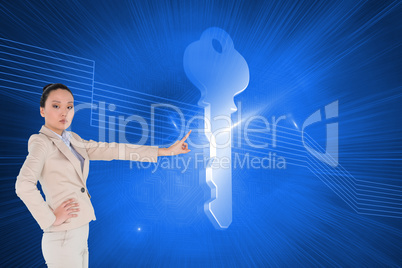 Composite image of unsmiling asian businesswoman pointing