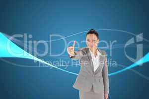 Composite image of smiling asian businesswoman pointing