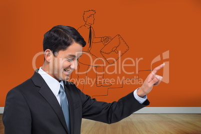 Composite image of smiling asian businessman pointing