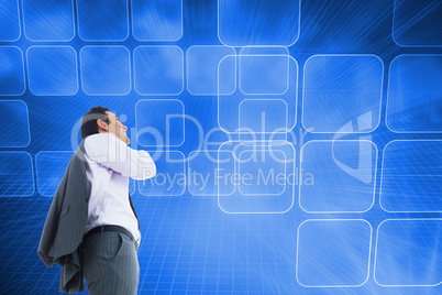 Composite image of smiling businessman standing