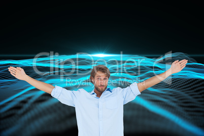 Composite image of handsome man raising hands