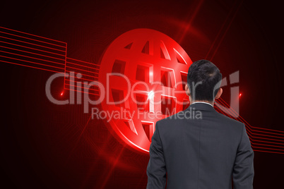 Composite image of shiny red globe on black background