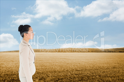 Composite image of unsmiling asian businesswoman