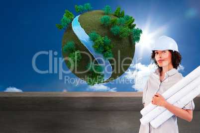 Composite image of confident woman holding construction plans