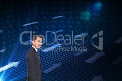 Composite image of smiling businessman looking at camera