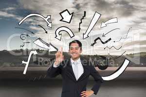 Composite image of smiling asian businessman pointing