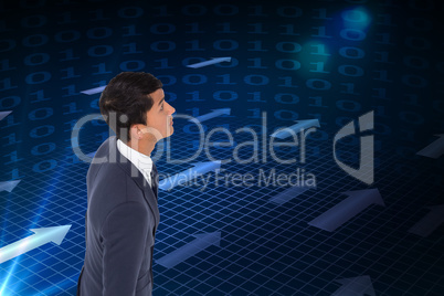 Composite image of unsmiling casual businessman walking