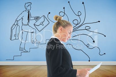 Composite image of businesswoman holding tablet Composite image of businesswoman holding tablet