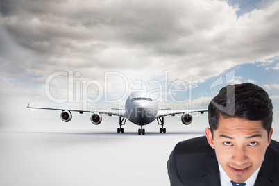 Composite image of smiling asian businessman