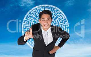 Composite image of smiling asian businessman pointing