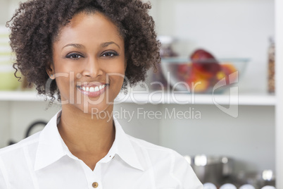 mixed race african american girl in kitchen