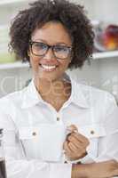 mixed race african american girl drinking coffee