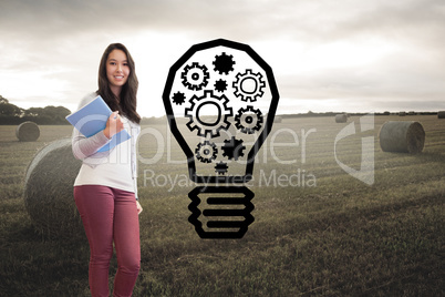 Composite image of smiling student in a computer room