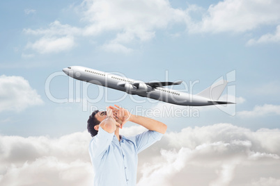 Composite image of shouting casual man standing